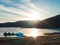 Peaceful sunrise at the lake: Sailing boats moored, quiet mood