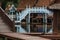 Peaceful thai floating architecture with traditional wooden house and bridge in Ancient City