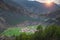 A peaceful Tibetan dwellings surrounded by mountain range