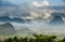 Peaceful view of Vinales valley at sunrise. Aerial View of the Vinales Valley in Cuba. Morning twilight and fog. Fog at dawn in th