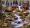 Peacefully flowing stream and waterfalls