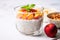 peach chia pudding in a transparent dish