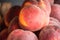 Peach close up fruit background. Peaches a lot