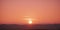 Peach colored sunrise over the mountains. Beautiful landscape. Panoramic view, romantic background