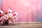 Peach flowers on branches against a wooden backdrop with text space