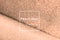 Peach fuzz, color of the year 2024, wave shiny glitter paper texture. Shining luxurious fabric. Glimmering golden color