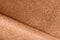 Peach fuzz, color of the year 2024 wave shiny glitter paper texture. Shining luxurious fabric. Glimmering golden color