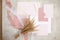 Peach pink pastel mock up composition of paper envelopes, seal wax, ribbons, hand craft jobbing. Weeding invitation. Top