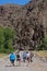 Peach Springs, Arizona, USA: Travelers walk along the winding Diamond Creek Road