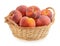 Peaches in basket isolated