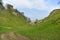 Peak District UK, old historic Peveril Castle, climb