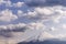 The peak of Mount Fuji covered in snow with a beautiful sky before sunset, Japan