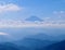 Peak of Mount Fuji poking through cloudes