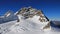 Peak of mount Jungfrau and glacier with large crevasses.