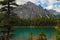 Peak over Turquoise Lake and Pines