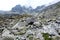 peak of Rysy mountain covered in mist. autumn ascent on hiking t