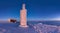 The peak of the Snezka Mountain in winter in the Krkonose Mountains. Panorama Snezka after a sunset tinged in beautiful pastel col