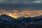 Peaks and slopes of the high snow-capped mountains of the Trans-Ili Alatau during early sunrise on an early winter morning