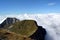 Peaks towering above the clouds