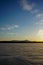 The peaks of the Ural mountains against the backdrop of a frozen lake