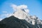 peaks of the wetterstein mountains in the clouds in the early morning, view from mittenwald town