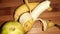 pealed banana  on brown background closeup image