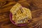 Peanut brittles in plate on wooden table