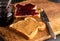 Peanut Butter and Jelly Sandwich on a Wooden Kitchen Counter