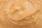 Peanut butter texture. Creamy peanut butter. Tasty peanut butter as background