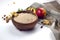 Peanut flour in wooden bowl, apple and cookie with peanut butter