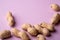 Peanut minimal on purple background backdrop food nut texture copy space