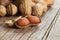 Peanut in nutshell on wooden background. Composition of peanuts