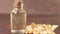 Peanut oil on a brown background close-up. selective focus. the use of oil in cooking, dietetics, cosmetology, an