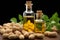 Peanuts adorned with leaves beside a bottle of golden, flavorful peanut oil