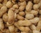 Peanuts shell texture closeup background. Vegetarian organic meal. Legume peanut fruits.