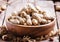 Peanuts in shell, vintage wooden background, selective focus