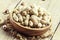 Peanuts in shell, vintage wooden background, selective focus