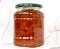 Pear jam in a glass jar. Pear slices in sugar syrup