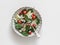 Pear, spinach, gorgonzola cheese, strawberry salad on a light background, top view