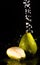 Pear under sparking water jets