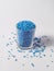 Pearl blue masterbatch granules on white background
