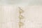 Pearl buttons on ivory wedding dress