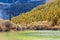 Pearl Lake or Zhuoma La Lake and snow mountain in autumn in Yading Nature reserve, Sichuan, China