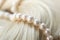 Pearls in Beauty: The Timeless Elegance of Combining Lustrous Pearls with Silken Hair for Glamour