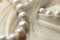 Pearls in Beauty: The Timeless Elegance of Combining Lustrous Pearls with Silken Hair for Glamour