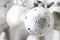 Pearly christmas balls with designs of bright brilliant flowers