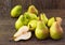 Pears on rustic wood background