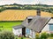 Peasant farm and harvested field in Normandy