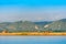 The peasants working on the bank of the river Irrawaddy, Mandalay, Myanmar, Burma. Copy space for text. Vertical.