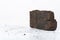 Peat briquette on white background, alternative fuels, place for text
